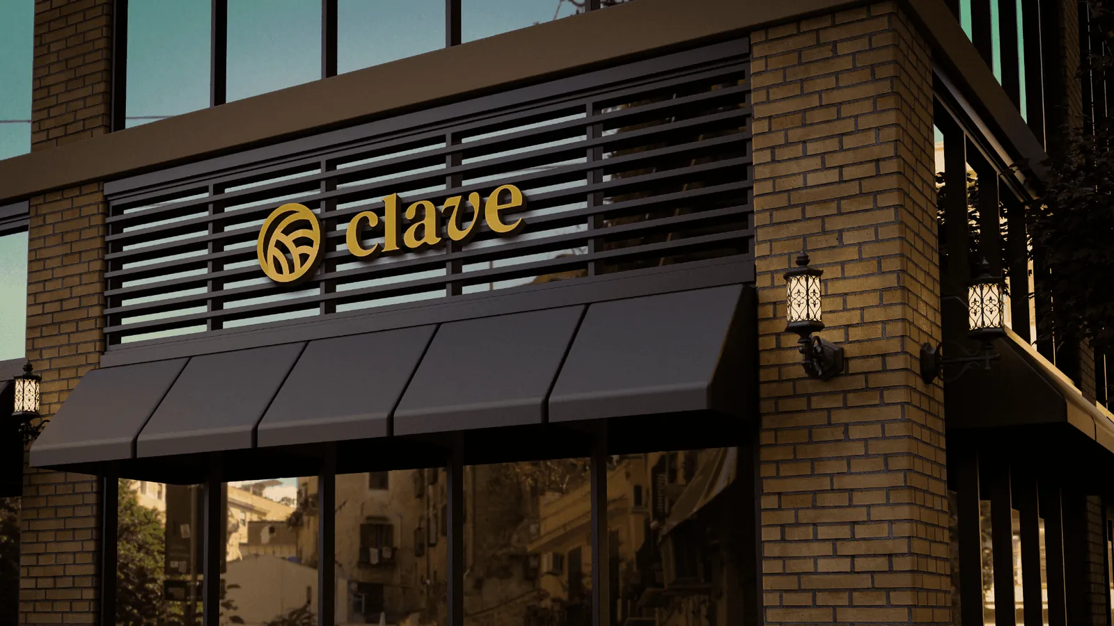 Fachada de cafeteria com o logo da Clave em dourado acima do toldo